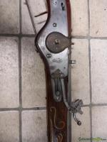 Alte Steinschlosswaffe