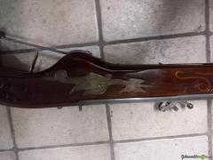 Alte Steinschlosswaffe